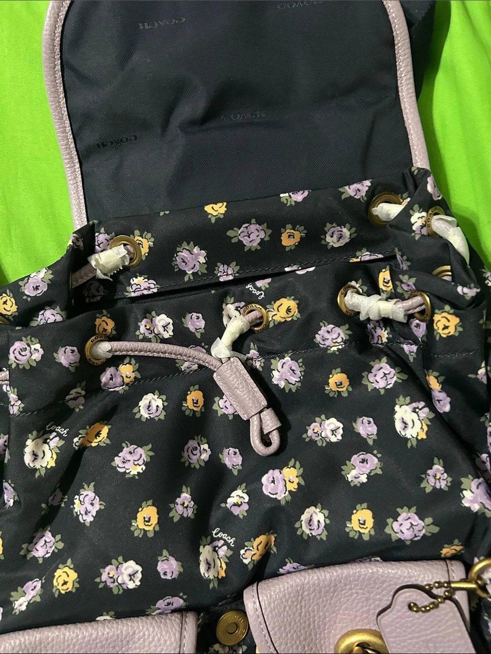 Coach Black Floral Backpack with Lavender Trim and Gold Hardware